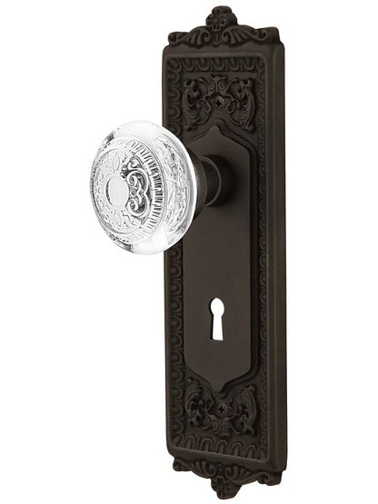 Egg and Dart Door Set with Keyhole and Matching Crystal-Glass Knobs in Oil-Rubbed Bronze.